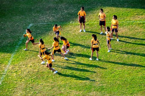 Students playing at the field